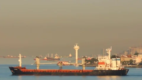 Freighter in the strait Stock Footage 79362756