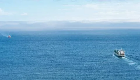 Freighters in the sea Stock Photos