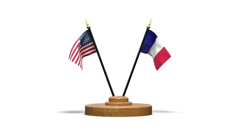 French and American flags on a small wooden base on the occasion of a meeti.. Video stock 277688759