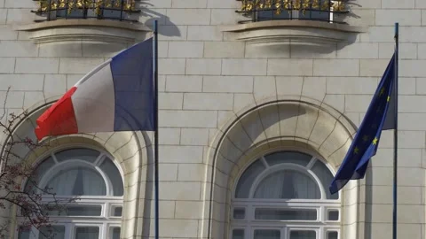 French and EU flag in front of French embassy in Vienna, Austria Video stock 147436295