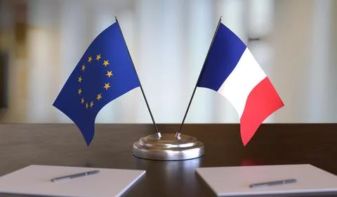 French and EU flags on table. Negotiation between European Union and France.  스톡 사진