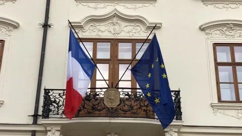 French and EU flags waving in the wind on the building in Bratislava Stock Footage 86293288