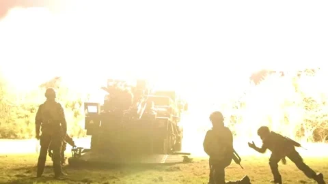 French Army soldiers fire Caesar self propelled Howitzer at night Video stock 237603642