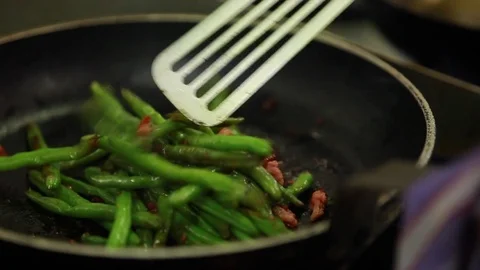 French beans with bacon in pan Stock Footage 74998350