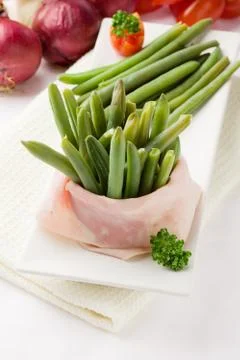 French beans with wrapped ham Foto stock