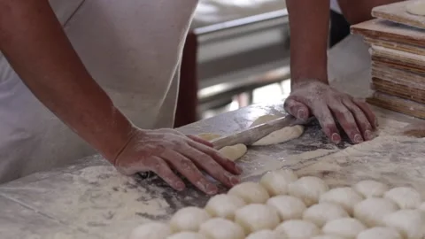 French bread elaboration. Concept of food industries. Stock Footage 221216034