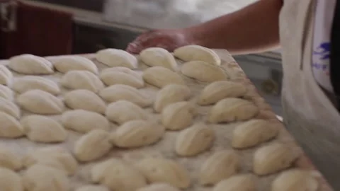 French bread elaboration. Concept of food industries. Stock Footage 221216127
