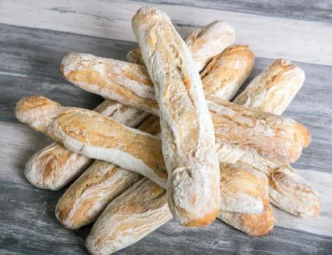 French bread on a rustic table Foto stock