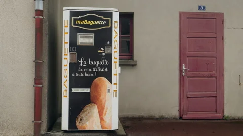 French bread vending machine on the street in a village. Normandy, France. Stock Footage 218802907