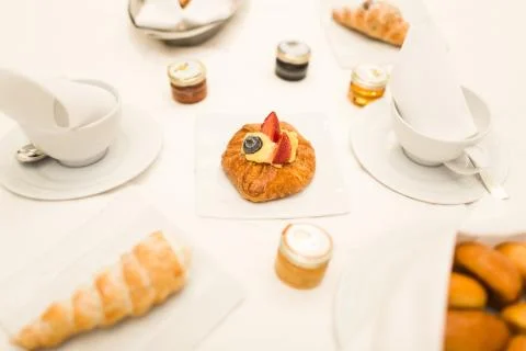 French breakfast in bed at hotel Stock Photos