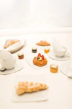 French breakfast in bed at hotel Stock Photos