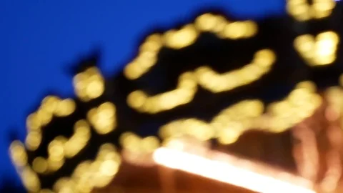 French Carousel Is Spinning Glowing With Lights Stock Footage