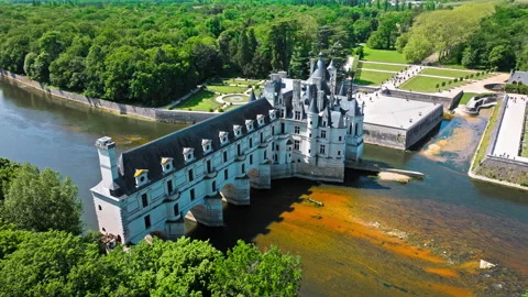 French castle spanning the languid Cher River atop a graceful arched bridge. Stock Footage 271629074