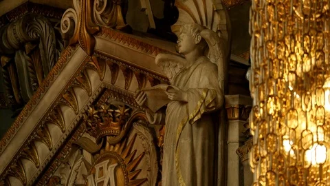 French Cathedral with Angel reading parchment Close up Stock-Footage 101198487