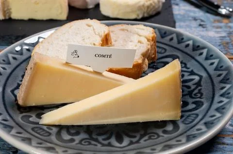 French cheese Comte, three varieties 1 year matured Prestige, fruity flavou.. Stock Photos