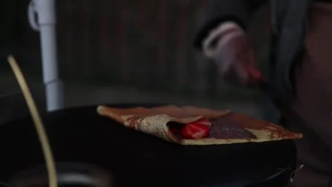 French Chef Preparing Delicious Nutella Strawberry Crepe in Paris, Close-up Stock Footage 252751503