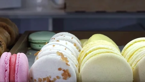 French colorful macarons background, close up. Different flavor of macarons Stock Footage 283402389