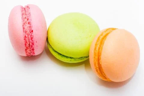 French colorful macarons on white background Stock Photos