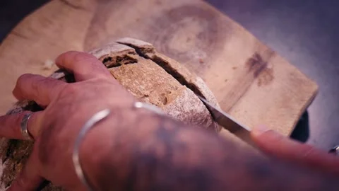 French Country Bread Slicing Tradition on Wood Stock Footage 337468027
