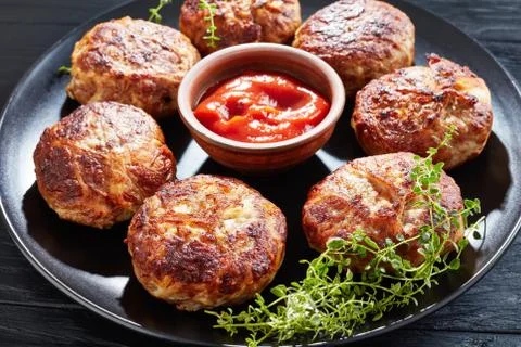 French crepinette, fried flat sausages or patties Stock Photos