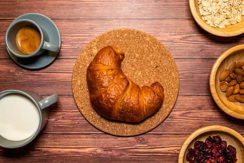 French croissant on a breakfast table Stock Photos
