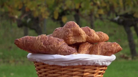 French croissants in a rotating basket Stock Footage 56512082