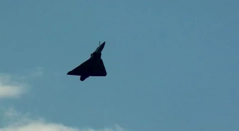 French Dassault Mirage 2000 supersonic jet fighter performs aerobatic maneuvers. Stock Footage 172243593
