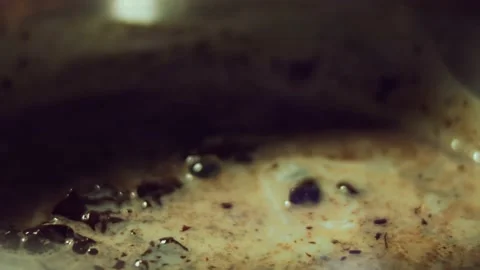 French dessert chocolate eclair. Pouring melted chocolate on eclairs Stock Footage 238994473