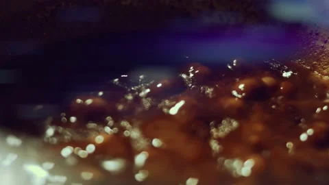 French dessert chocolate eclair. Pouring melted chocolate on eclairs Stock Footage 238994525