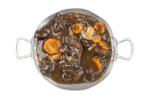 French dish "beef bourguignon" isolated on a white background Foto stock