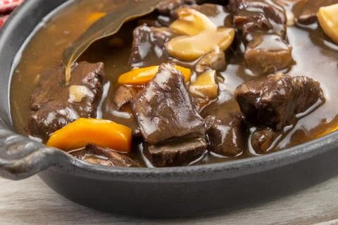 French dish " beef bourguignon " on a table Stock Photos