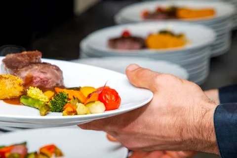 French dish breaded beef with vegetables and potatoes Stock Photos