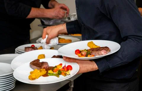 French dish breaded beef with vegetables and potatoes Stock Photos