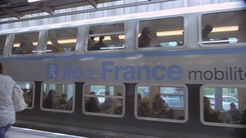 French double decker train leaving metro station, Paris, France, Video Stock Footage 280265749