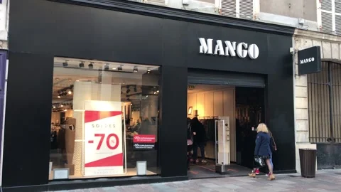 French facade with Logo of MANGO brand store shop in Le Mans, France, 31.1.2021 Stock Footage 147516148