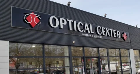 French facade with Logo of OPTICAL CENTER brand store shop in La flèche, France, Stock Footage 152347148