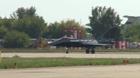 French fighter Dassault Rafale moves from parking lot to runway. MAKS-2011. Stock Footage 208353153