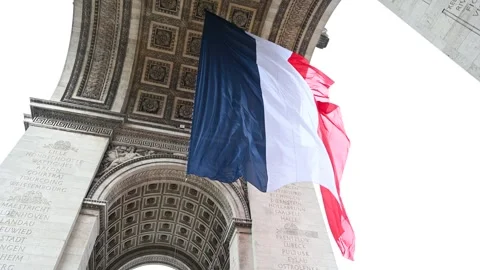 French flag on Arc de Triomphe in Paris. The national flag of France. Stock Footage 241030283