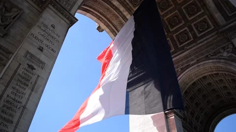 French flag blowing arc de triomphe Stock Footage 149054168