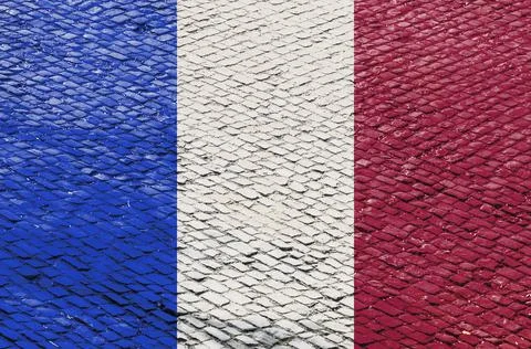 French Flag on a Cobblestone Road Pattern 스톡 사진