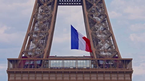 French flag in the design of the Eiffel Tower on National Day. Paris, France Stock Footage 312671574