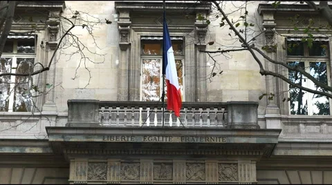 The french flag on the façade of the police prefecture building, paris Stock Footage