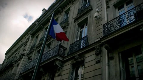 French Flag Flies in Front of Paris Architecture | Paris 2024 Stock Footage 277746851