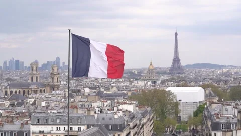 French Flag Floating In the Wind Over Paris Skyline, Main Monument adn Stock Footage 260366911