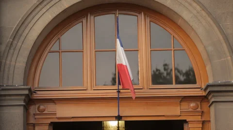 FRENCH FLAG IN FRONT BUILDING Video stock 28676966
