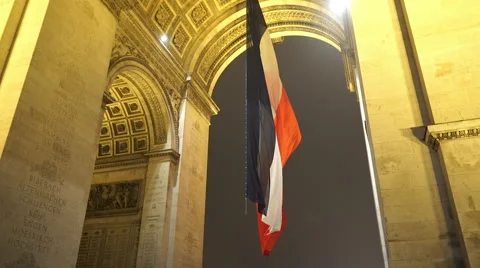 French flag hanging from Arc de triomphe in Paris Stock Footage 45028956