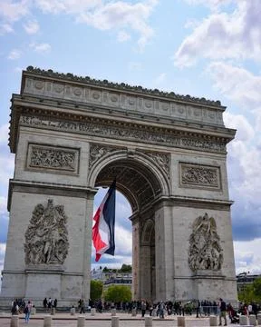 French flag hanging under Arc de Triomphe Paris, France June 4 2025 Stock Photos