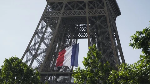French flag waving on Eiffel tower during coronavirus quarantine 4K Stock Footage 130145560
