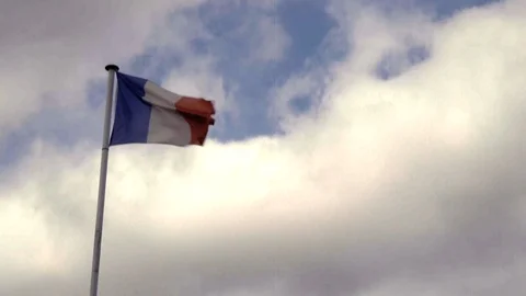 French flag waving in the wind | 4K - VINTAGE STYLE - 8MM FILM YELLOW Stock Footage 98662254