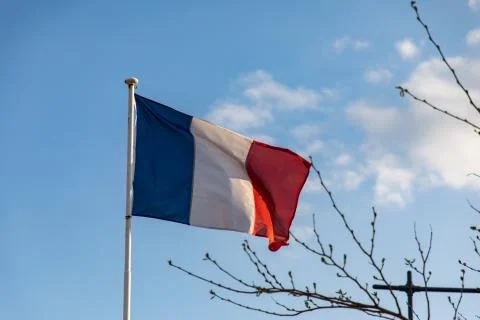 French flag waving on the wind Stock Photos
